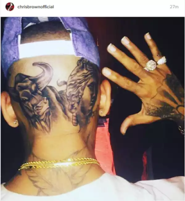 Chris Brown shows off his tattoos
